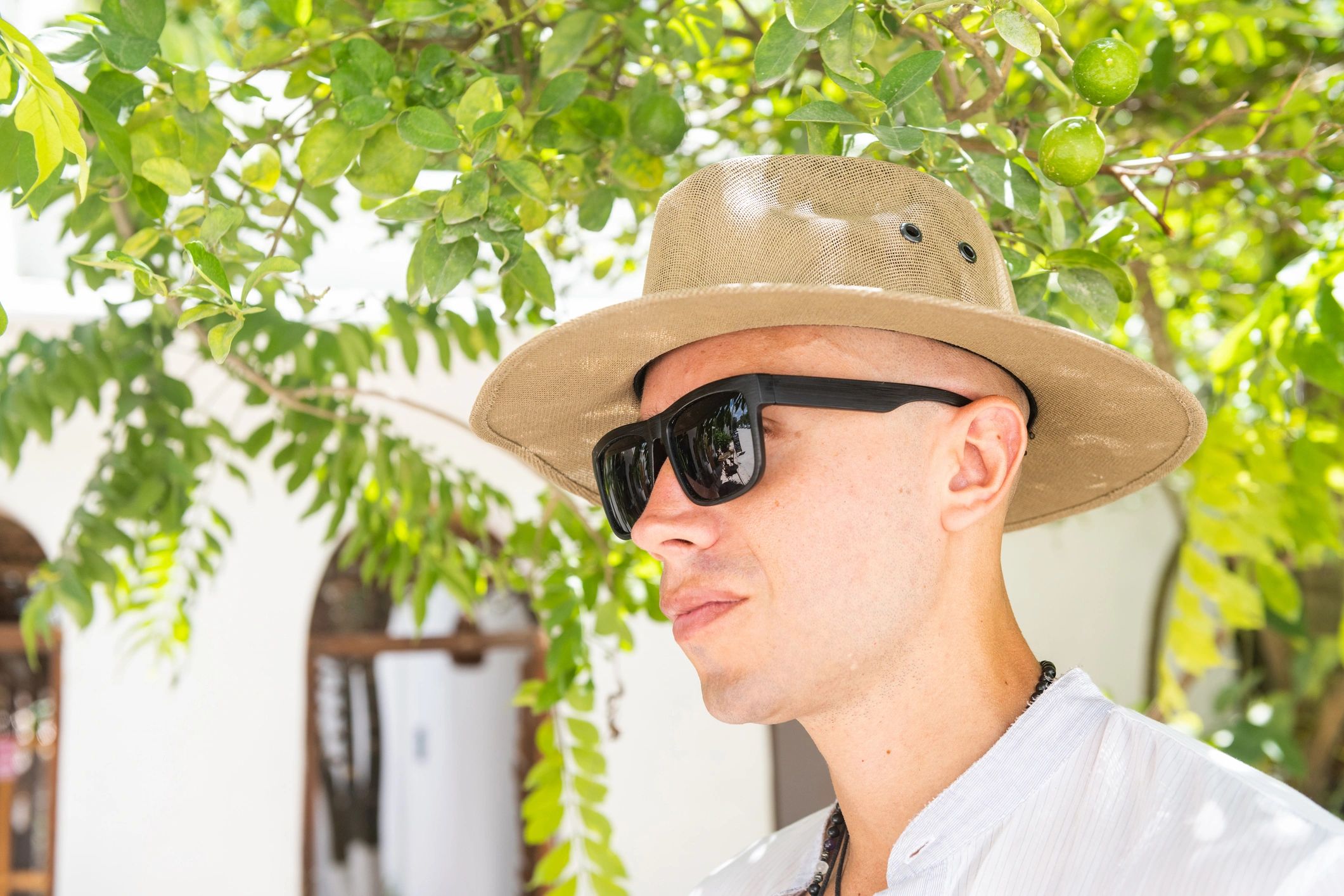 Man in a hat outdoors for a premium casual lifestyle image