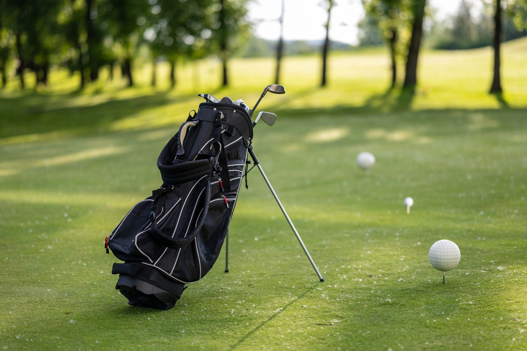 Golf gear arranged on a golf course